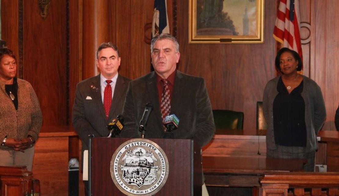 Assistant Professor of Criminal Justice Gary Berte speaks at the podium after being appointed to the Springfield Community Police Hearing Board.